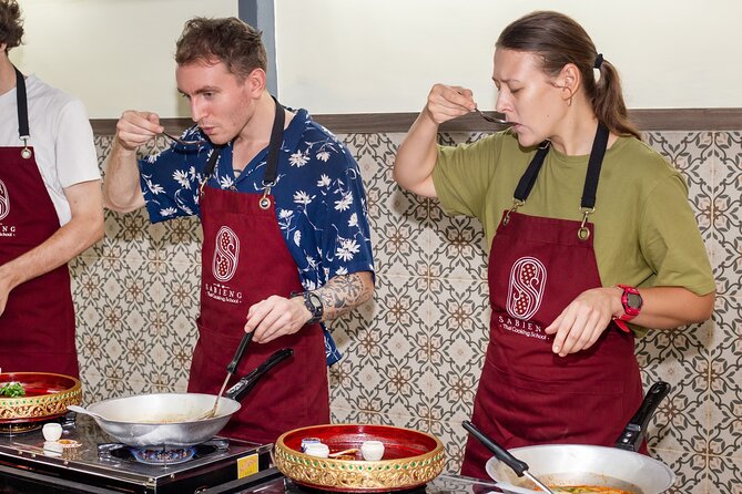 Authentic Thai Cooking with the Largest market visit &TukTuk ride - Inside Sabieng Thai Cooking School: clean kitchen, small-group flow