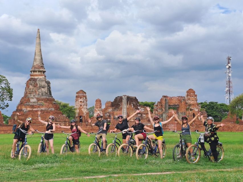 Ayutthaya City and Historical Park Bike Tour - Chao Phrom Market: amulets, food stalls, and sensory overload in a good way