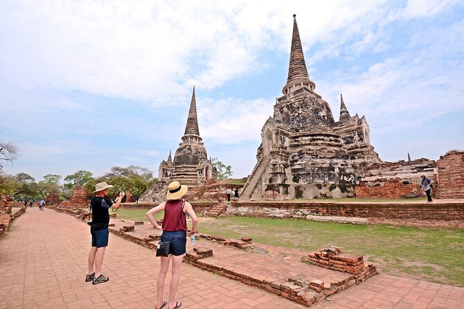 Ayutthaya Sunset Tour: UNESCO Temples & Peaceful River Cruise - Fruit market time, snacks, and what the day feels like