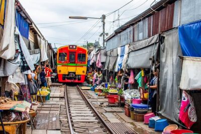 Bangkok: Floating Market and Train Tour with Guide in Spanish and English - Price and Value: What You Pay for at $25.75
