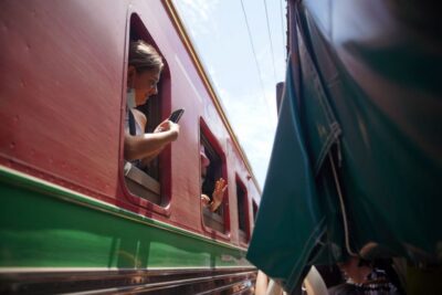 Bangkok: Maeklong Railway Market and Floating Market Tour - Damnoen Saduak: Paddle Boat Views and Canal-Edge Market Life