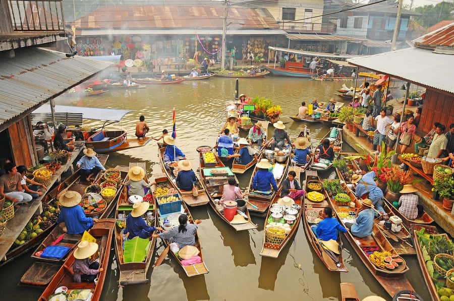 Bangkok: Maeklong Train Market & Floating Market Day Tour - Maeklong Railway Market: where vendors disappear and reappear