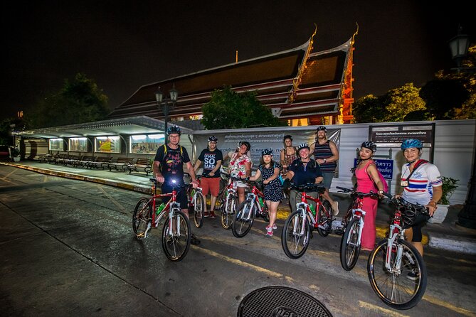 Bangkok: Night Bike Tour with Temples & Flower Market Visit - Stop-by-stop: Loha Prasat to the Democracy Monument backstreets