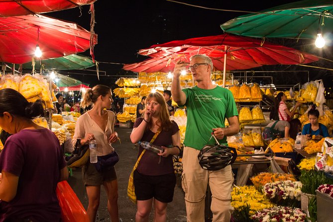 Bangkok: Night Bike Tour with Temples & Flower Market Visit - Rama VIII Bridge, Thammasat University roads, and a sunset ferry over the Chao Phraya