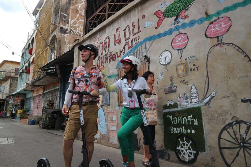 Bangkok: Riverside E-Scooter Adventure with StreetFood Snack - Local ferry crossing: the quieter way to change sides of the river