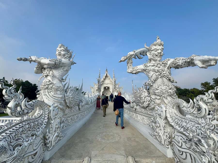 Chiang Rai: Explore 7 Major Sites with All Tickets Included - Wat Rong Suea Ten (Blue Temple): The Tiger Dance Temple in Blue and Gold