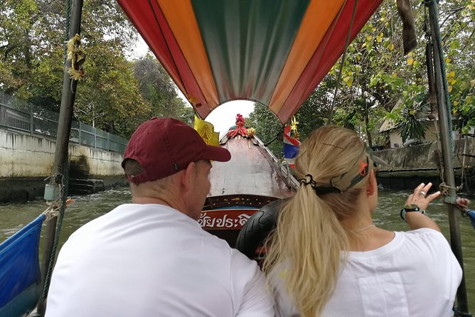 Explore Bangkok by Bike & Boat with Lunch - Wat Ko (Rooster Temple) and feeding fish for karma