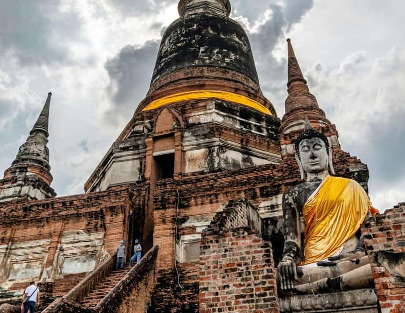 From Bangkok: Ayutthaya Heritage Tour with Sunset Boat Ride - Getting There From Bangkok in an Air-Conditioned Ride
