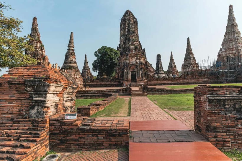 From Bangkok: Ayutthaya Heritage Tour with Sunset Boat Ride - Wat Yai Chai Mongkhon: The Chedi and the Reclining Buddha