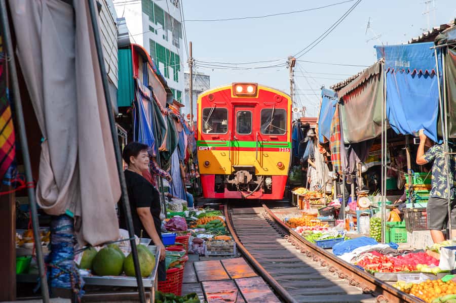 From Bangkok: Maeklong Railway and Floating Market Food Tour - On the Water: Longtail Boat Through Quiet Canals