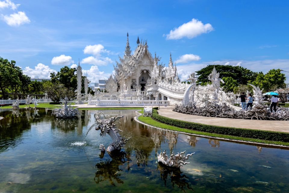 From Chiang Mai: Chiang Rai's Temples Exploration Day Trip - Wat Rong Suea Ten Blue Temple: deep blue paint and the tiger legend