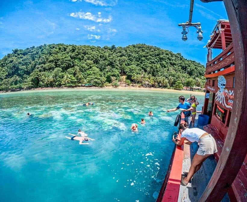From Koh Chang: 4 Islands Snorkel & Beach Tour by Big Boat - Beach Time on Ko Rang: White Sand, Turquoise Water, and One Annoyance