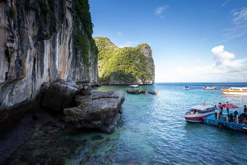 From Phi Phi: Half-Day Longtail Boat Tour to Maya Bay - Longtail boat comfort: small group size, big sun, and short breaks