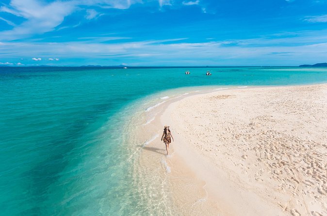 Full-Day Phi Phi and Maiton islands Tour by Speed Catamaran - Viking Cave snorkeling: coral, fish, and extra water toys