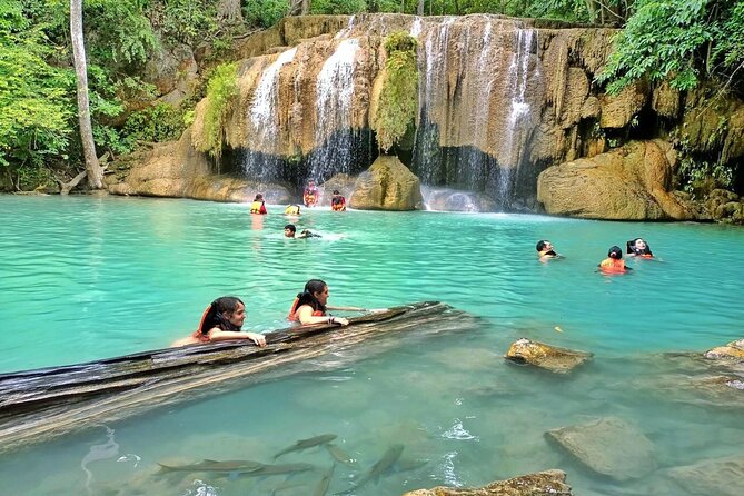 Kanchanaburi Full Day Tour: River Kwai and Erawan Falls - Why this day trip feels different from staying in Bangkok
