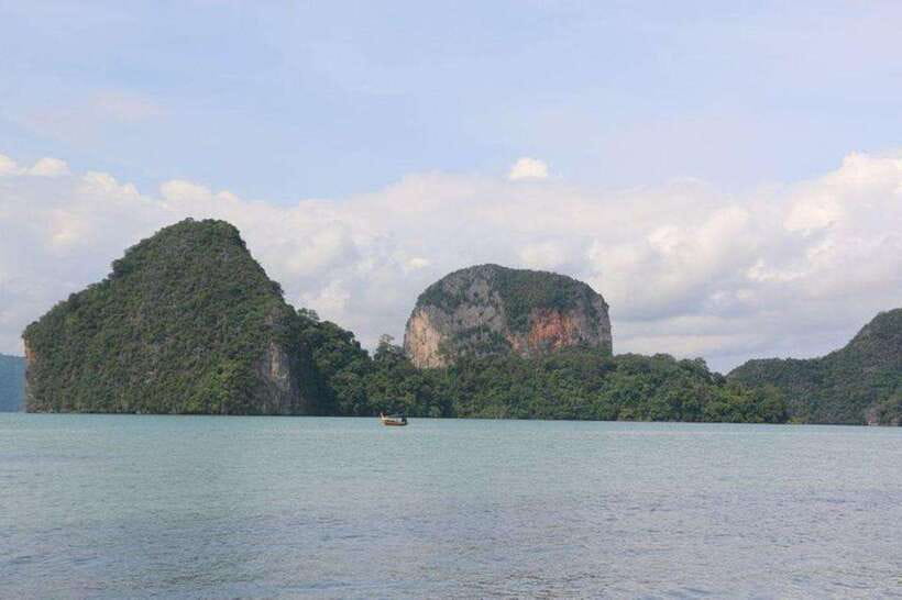 Khaolak: Phang Nga Bay, Tapu Island, and Panyi Village Tour - Entering Phang Nga Bay by Long-Tail Boat (What This Day Is Really About)