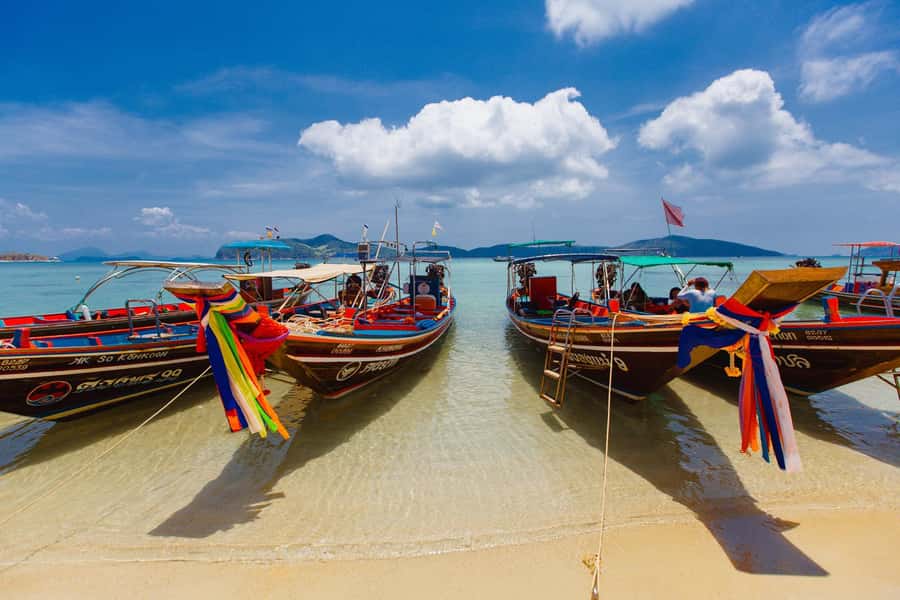 Koh Samui: Pig Island Private Longtail Boat Tour - Koh Taen snorkeling: clear water, coral, and fish you can actually see