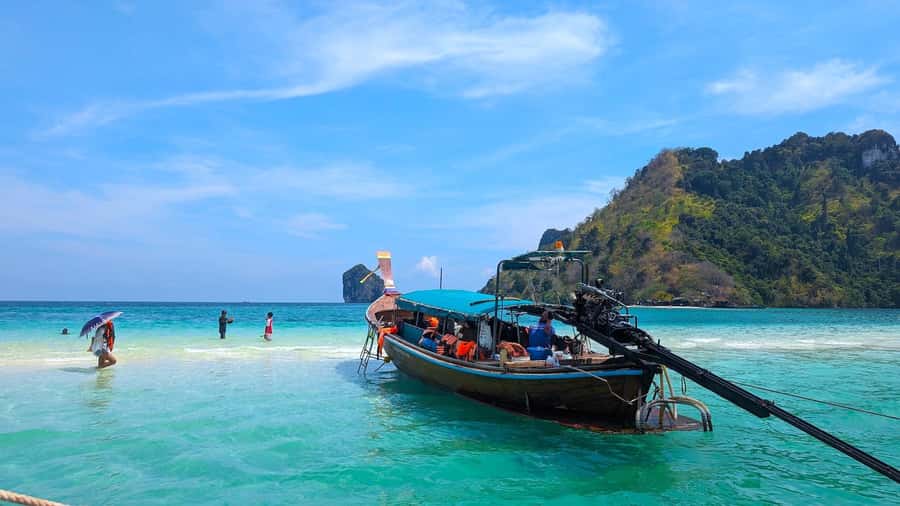 Krabi: Island Hopping Tour by Private Longtail Boat - Timing strategy: sunrise calm, fewer crowds, and late-afternoon sunset