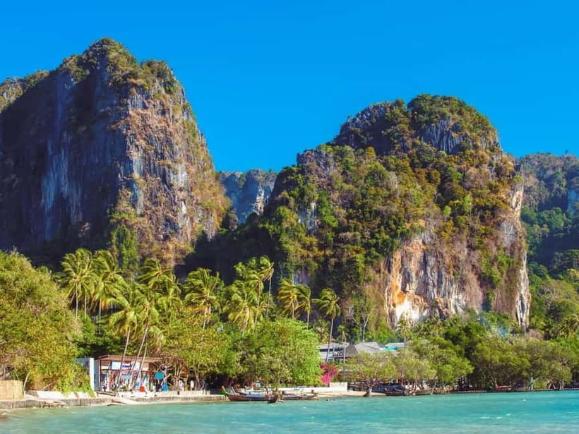 Krabi: Railay Phra Nang & Diamond Cave Sunset Plankton Tour - Railay Beach sunset time: shopping, snacks, and the main show
