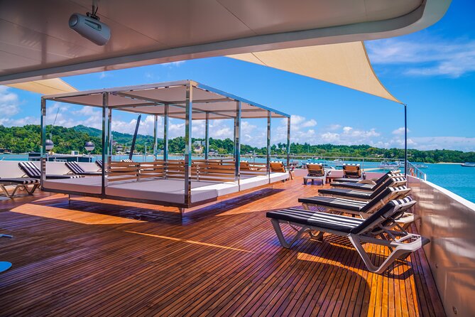 Luxury Boat to James Bond Islands with Lunch and Sunset Dinner - Onboard setup: Wi‑Fi, DJ, water toys, and life jackets