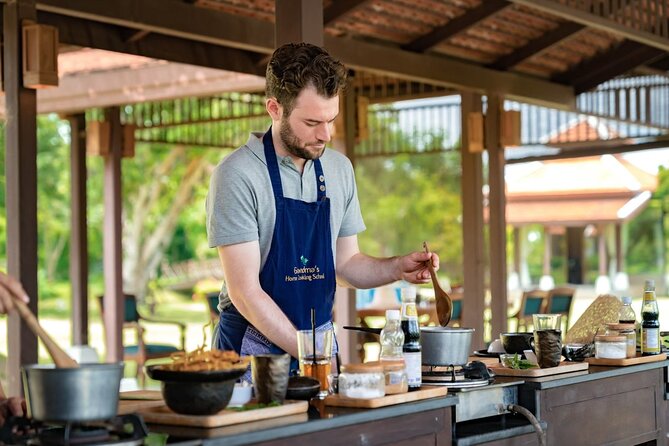 Morning Thai Cooking with Grandma - Market Visit & Farm Tour - Open-air kitchen setup: your own station and small-group pacing