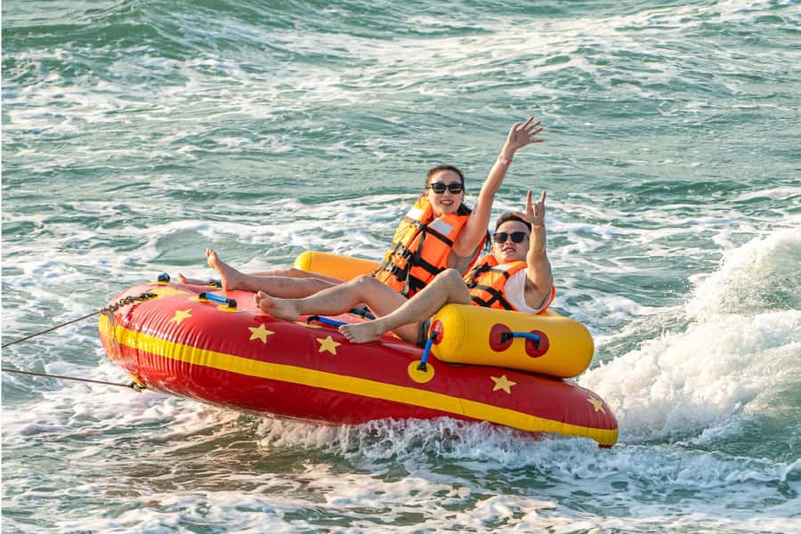 Pattaya: 3-Island Hopping Sunset Yacht & Buffet with Live DJ - Water activities: floats, clear kayaks, paddleboards, and the slide