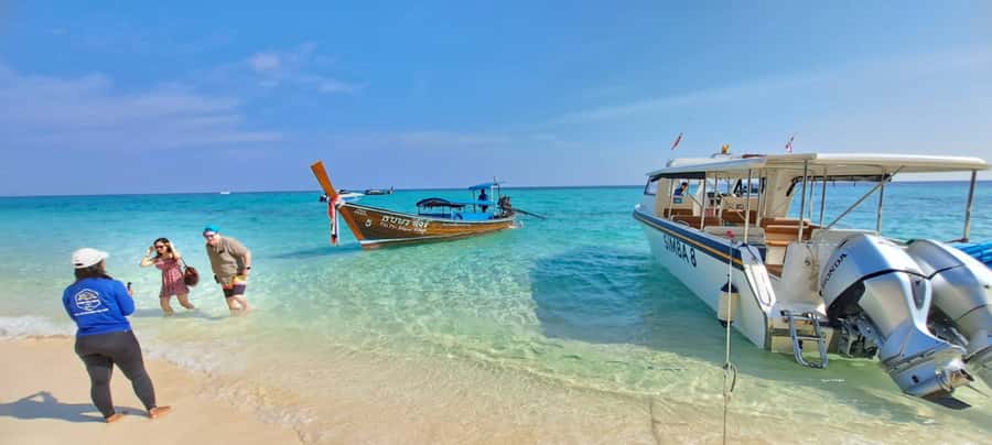 Phuket: Phi Phi Island Sunrise Group Speedboat Tour - Monkey Beach and Viking Cave: wildlife viewing with a story