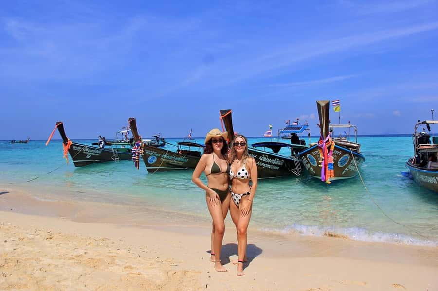 Phuket: Phi Phi & James Bond Island Combo Day Tour w/Lunch - Maya Bay at first light: photos, calm water, and a short walk