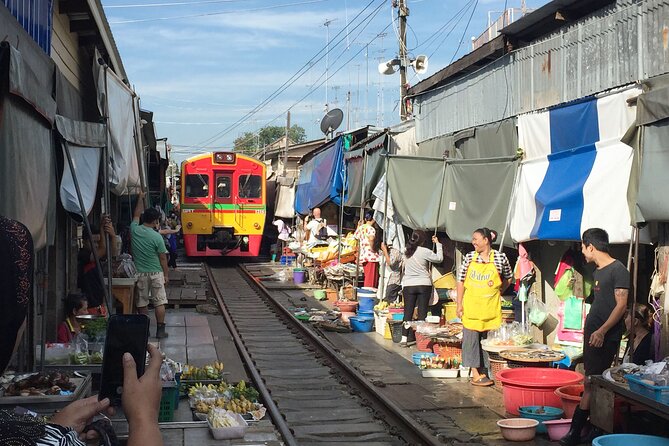 Private Excursion to Floating Market and Ayutthaya World Heritage - Maeklong Railway Market (Hoop Rom): the train moment you came for