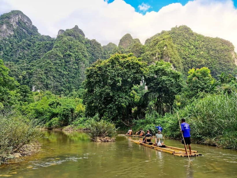 Sok River: Bamboo Raft Ride, Monkey Temple & View Point Tour - Sok River bamboo rafting: peaceful water, cliffs, and the bamboo-cup break
