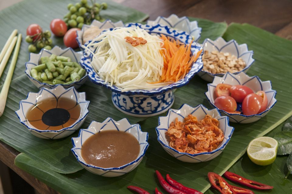 Sukhumvit: Hands-on Thai Cooking Class & Market Tour in BKK - The four-course meal: how the dishes connect