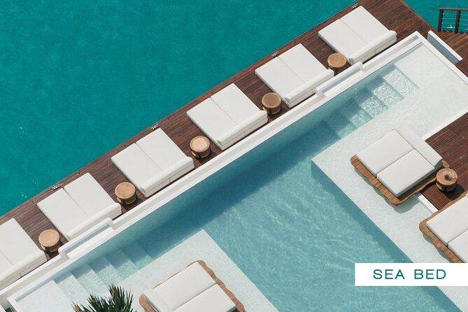 YONA Beach Club: Phuket's Most Incredible Boat Experience - What your ticket covers: entry, credit, welcome drink, towel, pool, insurance